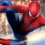 Spider-Man in a red and blue web-patterned suit crouches against a sunlit New York City skyline.
